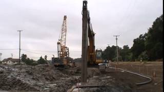 Excavating a Soil Bentonite Slurry Trench Cutoff Barrier Wall [upl. by Nadya796]