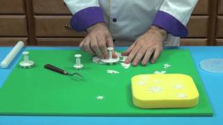 How to Make Gumpaste Snowflakes  Global Sugar Art [upl. by Anerev12]