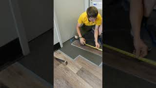 Cutting amp Installing Allure Flooring Around Metal Door Trim [upl. by Alleirbag]