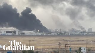 Explosions and fire at Khartoum airport as fighting continues in Sudan [upl. by Eimiaj473]