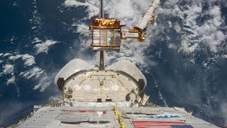 Flashback Space shuttle snags a spinning satellite with Canadarm [upl. by Ellenwahs]