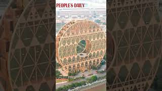 The 138metertall Guangzhou Circle is a landmark building in Guangzhou [upl. by Ekusoyr]