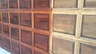 Garage door restoration and refinishing [upl. by Lemal]