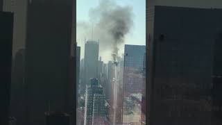 Construction crane catches fire in New York City and hits building [upl. by Siubhan]