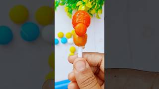 Orange flavour candy popsicle🍊🧡🍭youtubeshorts funny candy shortvideo viralvideo subscribe [upl. by Ennairrek]