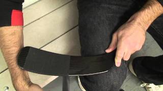 How To Tape A Hockey Stick Blade  HowToHockeycom [upl. by Retsehc]