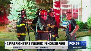 2 firefighters injured battling SE side house fire dog credited with alerting family [upl. by Rydder901]