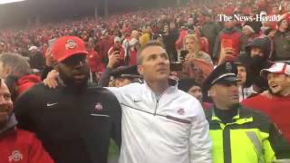 Ohio State coach Urban Meyer sings the alma mater after his teams win over Michigan on Saturday [upl. by Enar564]