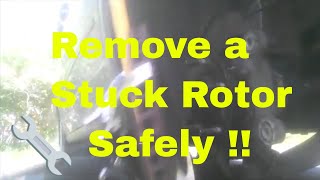 How to Remove a Stuck Rotor on Any Car [upl. by Adne890]