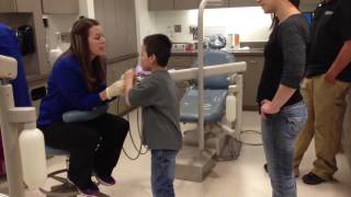 Autistic boy at the dentist before desensitization [upl. by Nyrhtak]