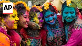 Holi festival celebrated with bursts of color across India [upl. by Heinrik783]