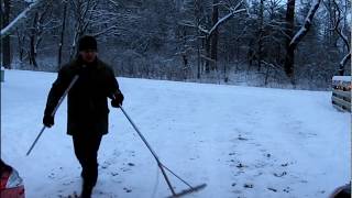 Snow Removal on a Rock Driveway ROOF RAKE [upl. by Oiramd269]