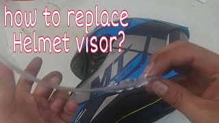 Replacing a motorcycle helmet visor  step by step easy guide [upl. by Naahs]