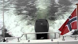 Askeladden 585 freestyle 135 hp mercury optimax 43 knotsvideo båten sepember 06avi [upl. by Atilehs936]