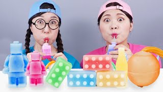 Kẹo chai sáp tráng miệng cầu vồng Mukbang DONA [upl. by Loni]