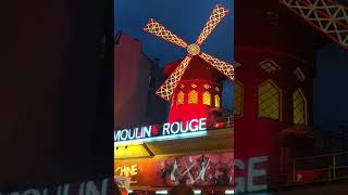 The Moulin Rouge lit up at night in Paris travel paris france [upl. by Connolly]