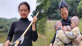 single motherwith two twin childrenchopping bamboo to make a new bedcooking with her two children [upl. by Donnenfeld716]