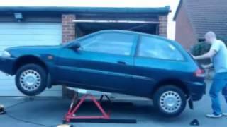 MINI TILTING CAR LIFT CL03 SUPPLIED BY CJ AUTOS [upl. by Urissa37]