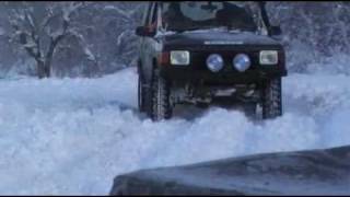 Off roading in deep snow Defenders and Discoverys stuck [upl. by Elleivap]