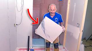 How to Install Bathroom Floor Tile for Beginners [upl. by Ardnahsal]