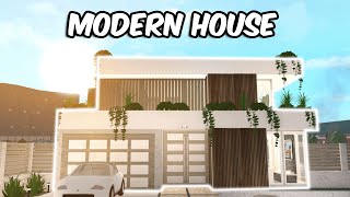 BUILDING A MODERN HOUSE IN BLOXBURG [upl. by Jelena381]