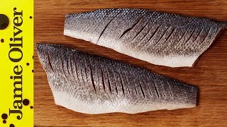 How to Fillet a Seabass  Jamie Oliver [upl. by Nivlag19]