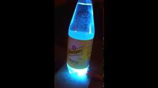 Schweppes glows blue under UV light [upl. by Akirehc352]