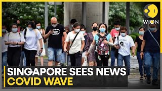 Singapore monitoring new Covid19 wave as infections rise  World News  WION [upl. by Enyallij]