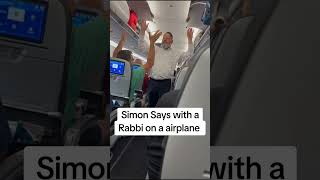 Rabbi Nosson Neuberger entertaining a delayed plane with a game of Simon Says [upl. by Ahsuas]