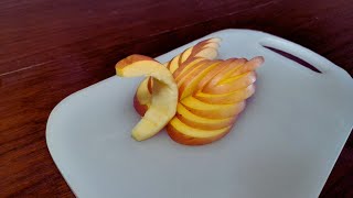 Slicing an apple to make a swan garnish  food art asmr [upl. by Uoliram]