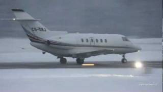 Snowy take off Raytheon Hawker 800XP at Airport BernBelp [upl. by Aicssej423]