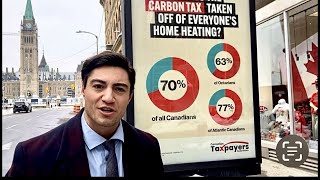 Anti carbon tax ad outside Trudeaus office [upl. by Aimek]