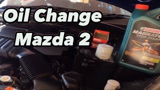 MAZDA 2  2010  CHANGE OIL [upl. by Neram]