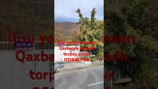 Qax İlisu yolun kənarı Qaxbaşda sənədli torpaq satılır 0518453188 [upl. by Ahsiad64]