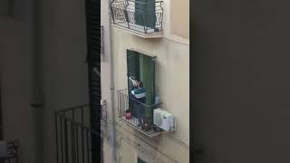 Trumpeter Performs Imagine on Italian Balcony During Coronavirus Lockdown [upl. by Dragone177]