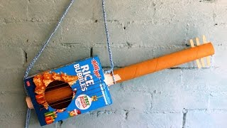 How to make a cereal box guitar [upl. by Esnofla270]