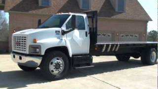 SOLD  2005 GMC C6500 24FT FLAT BED CAT 7 DIESEL FOR SALE SEE WWWSUNSETMILANCOMMPG [upl. by Silbahc]