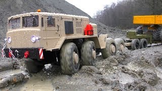 MAZ 537 AND KAT1 IN ACTION HEAVY RC TRUCKS WORK IN THE RAIN RC MUDDING [upl. by Agarhs]