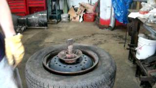 Coats 1010 Tire Changer Dismount of Tire [upl. by Culbert]