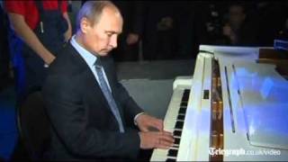 Vladimir Putin plays piano in singalong at Moscow theatre [upl. by Zeugirdor]