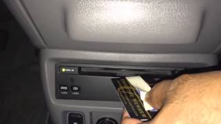 How to remove a stuck DVD or CD from a slot DVD player [upl. by Bertle808]