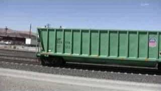 Short Semitruck wcrane on Union Pacific mainline in Reno [upl. by Eikin]