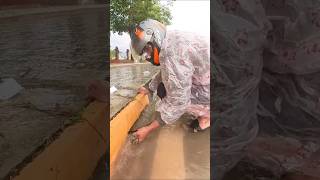 Cleaning Culvert Drain Rain Water On Road Street blockeddrain satisfying blockeddrains drainage [upl. by Lebasile986]