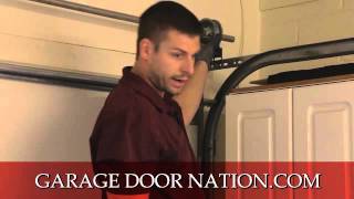 How to Fix A Crooked Garage Door [upl. by Gerius756]