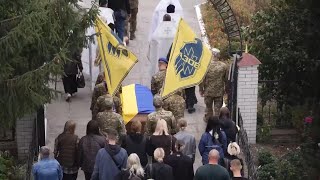 Family friends attend funeral for 20yearold Ukrainian fighter killed defending Toretsk [upl. by Margaux]