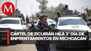 Siguen los enfrentamientos armados en Michoacán [upl. by Akinahs660]