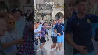 Scotland fans drink pub dry then conga through Munich streets [upl. by Bedelia]