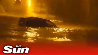 Two people killed after driving into flooded road and getting trapped in Liverpool [upl. by Reivazx941]