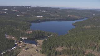 Råsjøen Jaktslottet Raasjøen Romeriksåsen  Flying Over Norway [upl. by Ocirred]