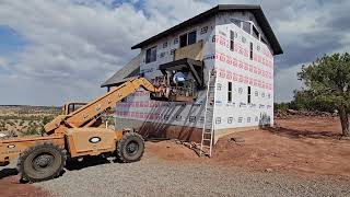 Installing a Juliet balconyLP Smartsiding on our off grid home [upl. by Berkeley]